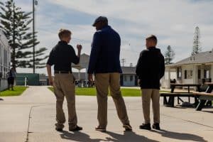 three men walking together