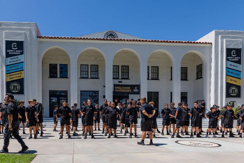 group of students in black uniforms