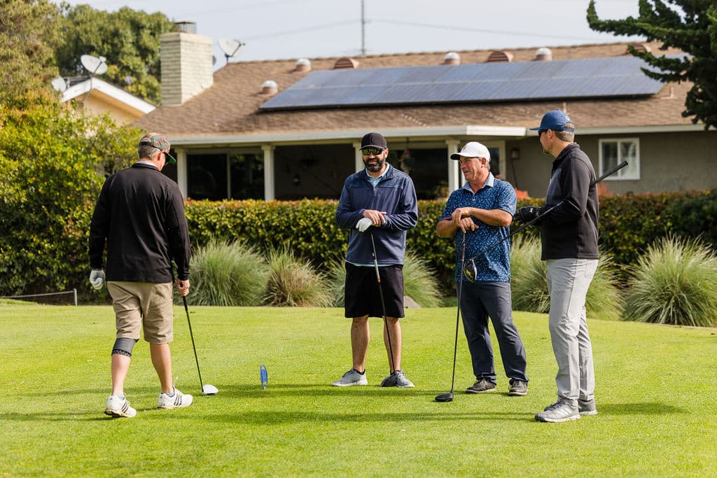 group of men playing golf